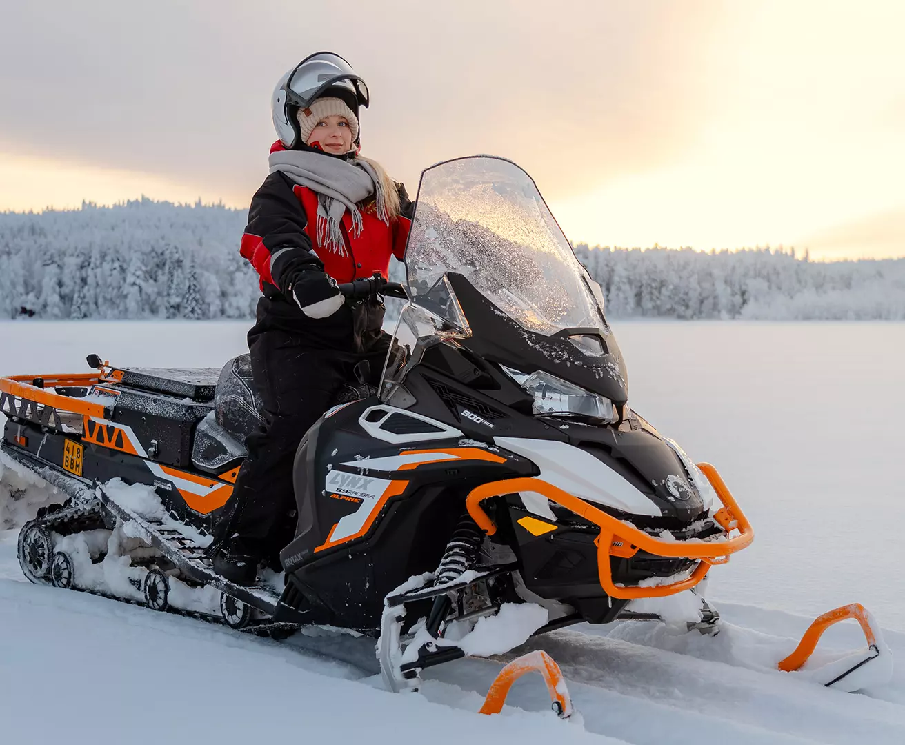 Snowmobile safari in Kuoksa Wilderness Park, Rovaniemi, Lapland, Finland. Snowmobile tour, snowmobile ride, snowmobile activity. Staylapland.