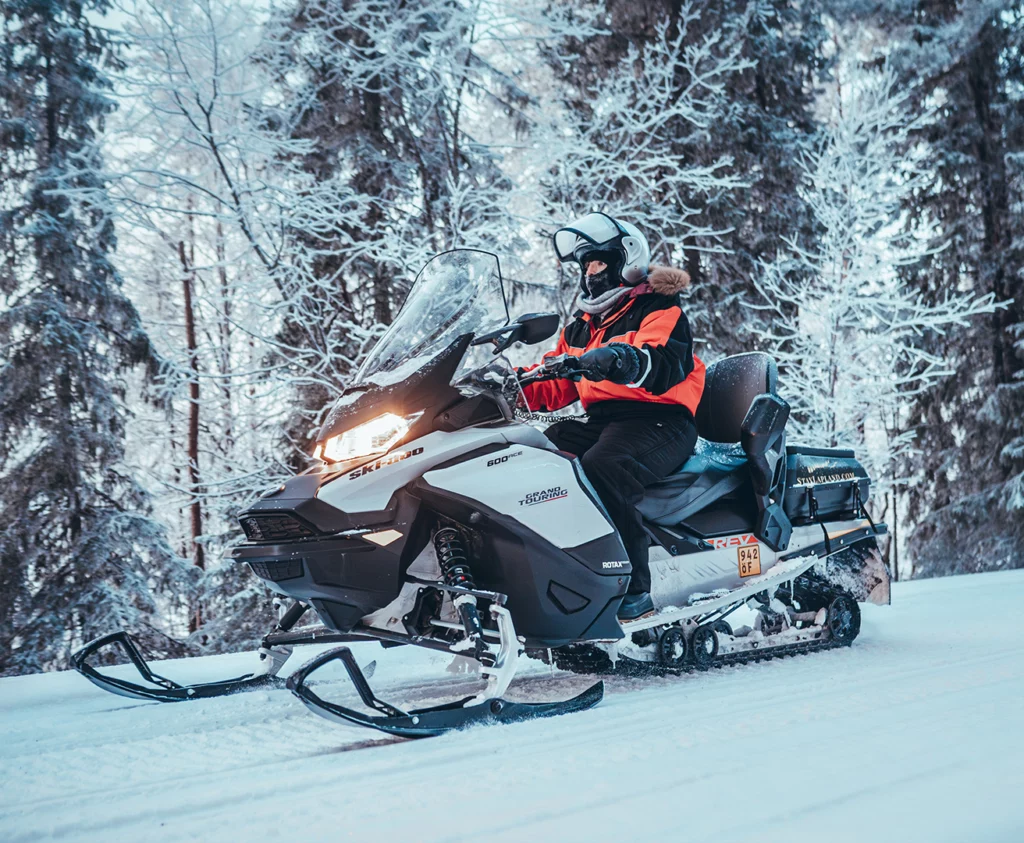 StayLapland Snowmobile tour in Rovaniemi, kuoksa wilderness park. Snowmobile safari, snowmobile activity, Lapland, Finland.