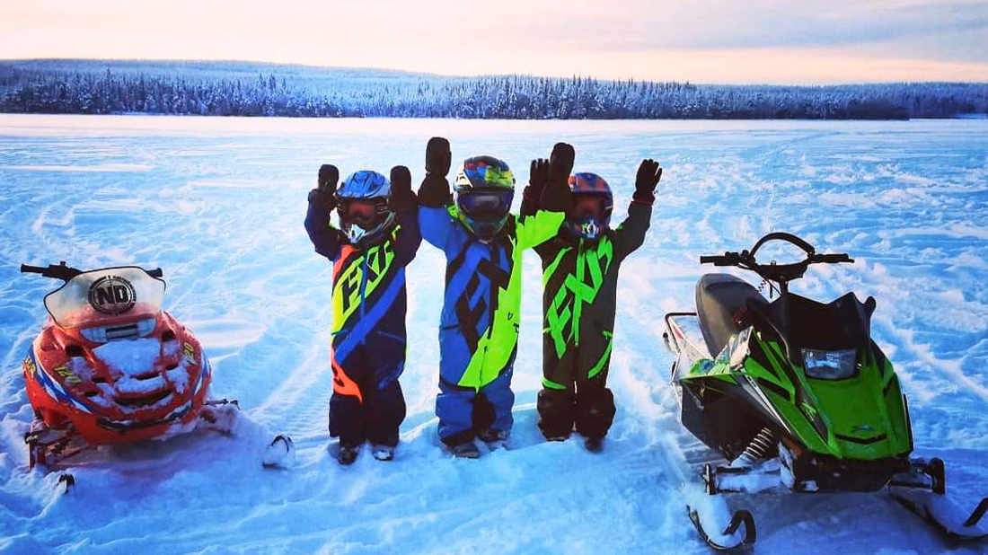 Mini snowmobiles for the children.